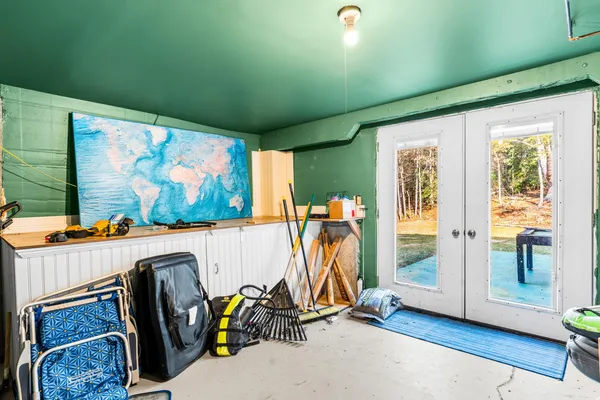 wooden floor with view of city and ocean