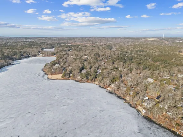a view of a house with backyard porch and sitting area