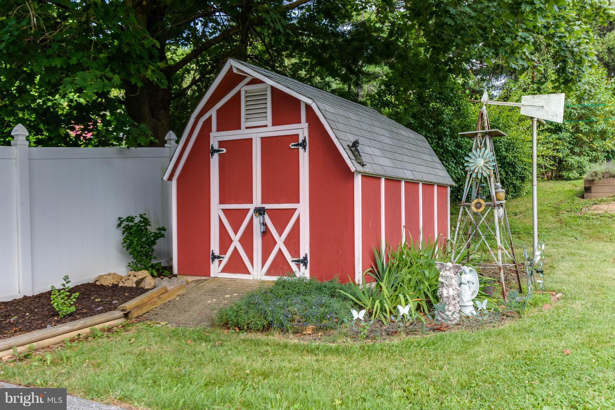 1609 Ridge Road Westminster, MD 21157 - Photo 22 of 28 a front view of a house with garden