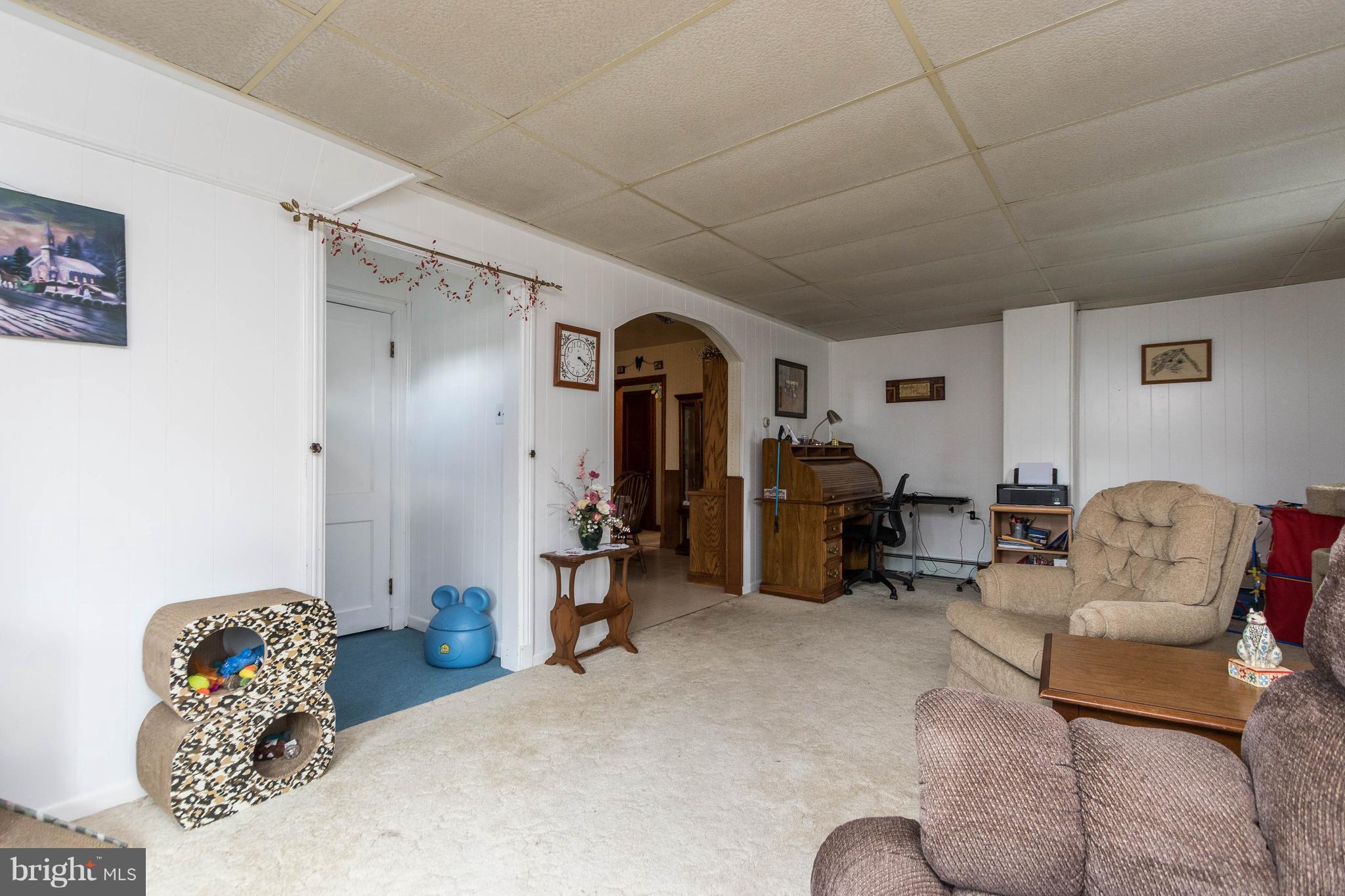 1609 Ridge Road Westminster, MD 21157 - Photo 5 of 28 a view of a livingroom with furniture and a couch