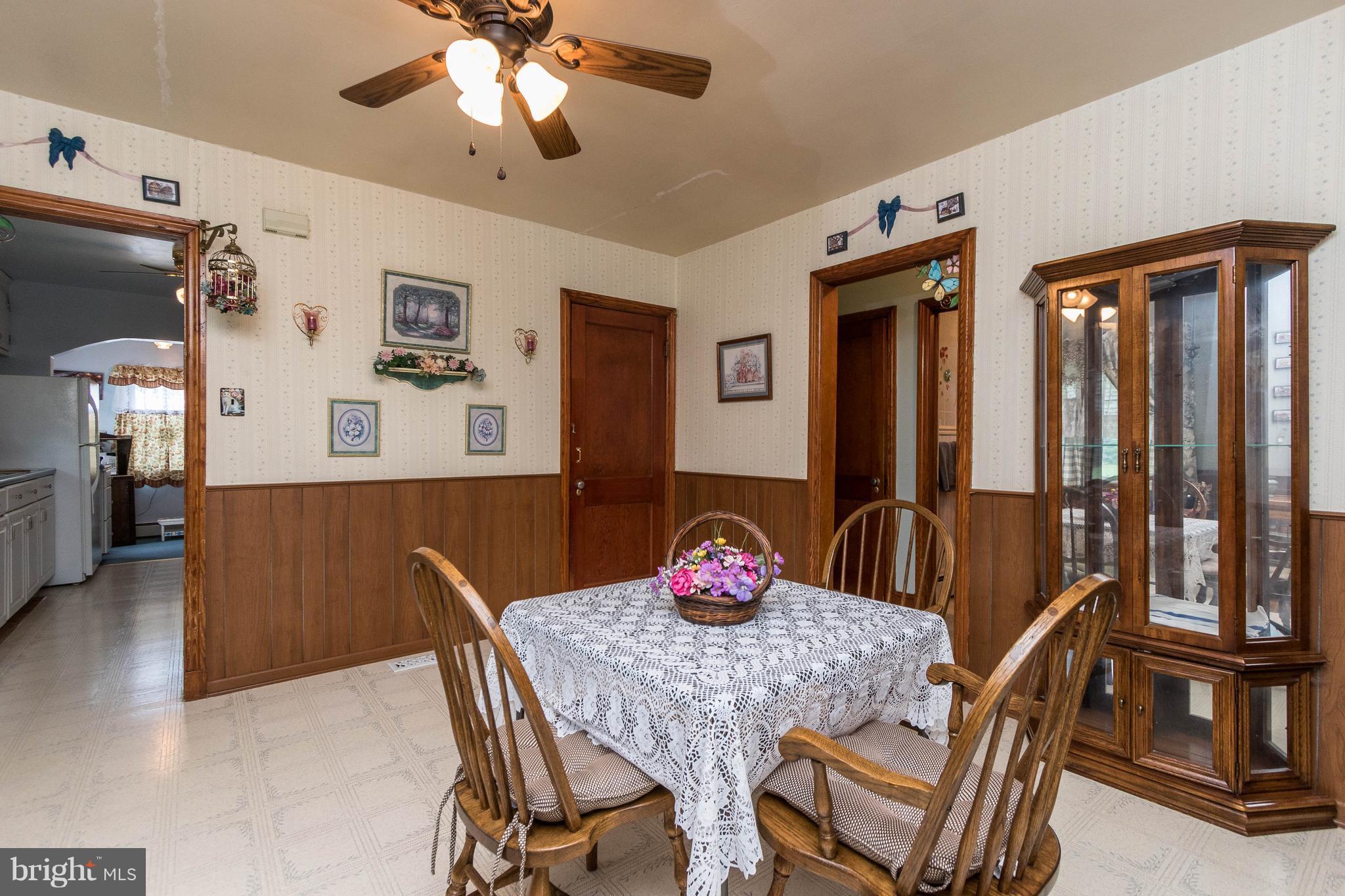 1609 Ridge Road Westminster, MD 21157 - Photo 7 of 28 a view of a dining room with furniture window and wooden floor