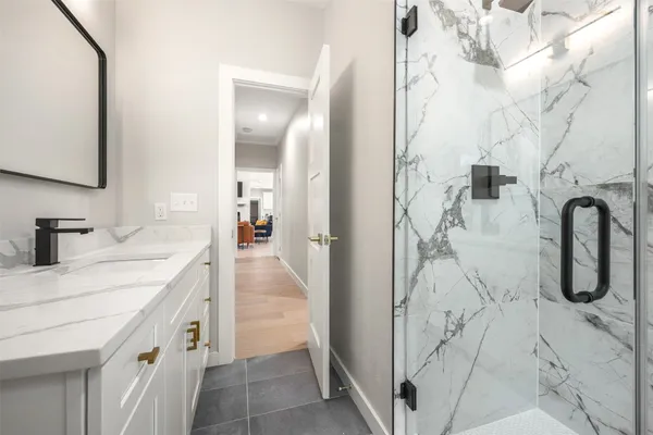 a bathroom with double vanity sink