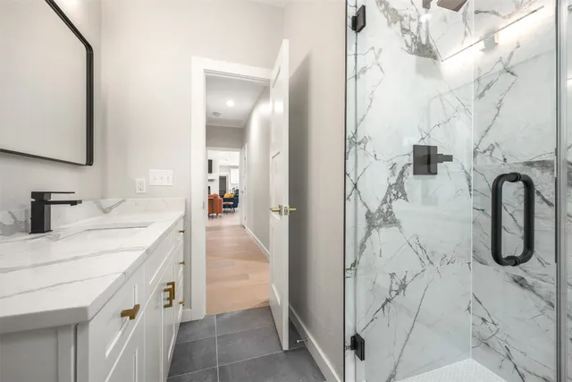 a bathroom with double vanity sink