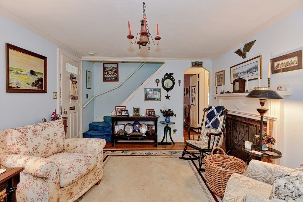 3 Centre Street Natick, MA 01760 - Photo 15 of 23 a living room with furniture and a flat screen tv