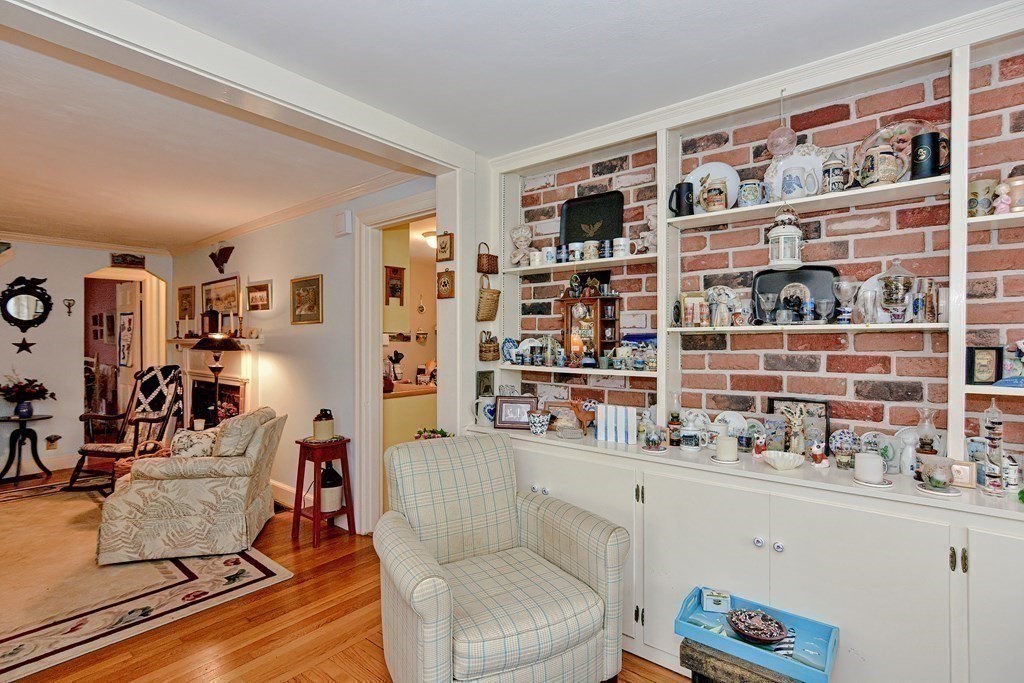 3 Centre Street Natick, MA 01760 - Photo 16 of 23 a living room with furniture cabinets and window