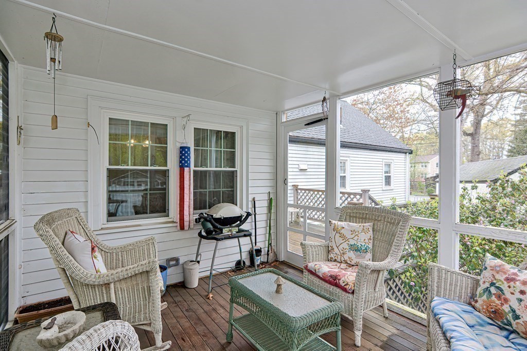 3 Centre Street Natick, MA 01760 - Photo 6 of 23 a living room with furniture and floor to ceiling windows