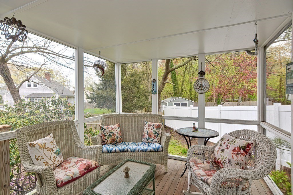 3 Centre Street Natick, MA 01760 - Photo 7 of 23 a living room with furniture and a floor to ceiling window