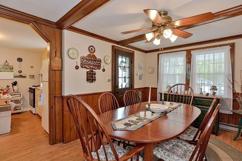 3 Centre Street Natick, MA 01760 - Photo 10 of 23 a view of a dining room with furniture window and wooden floor