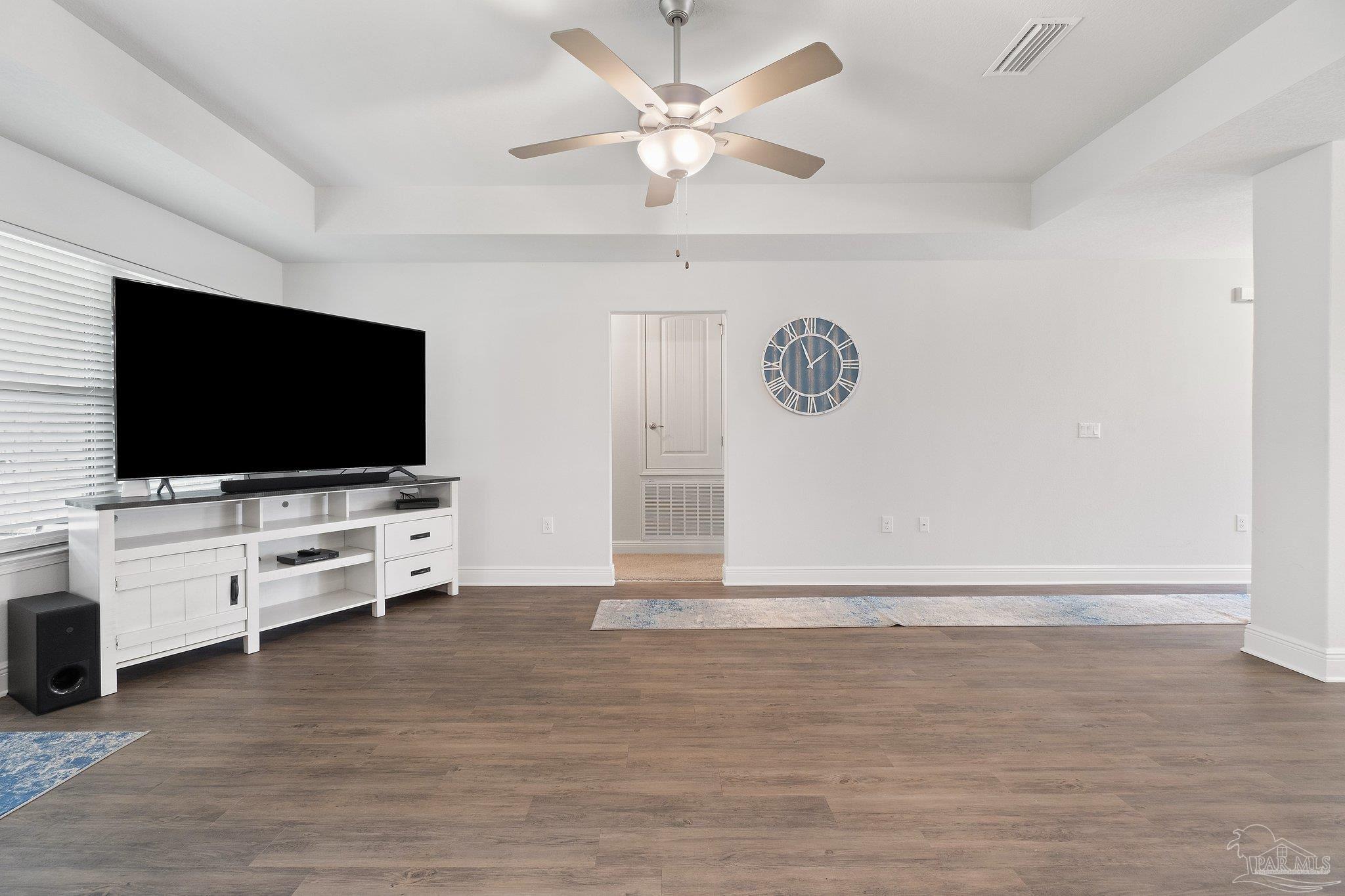 1463 Promenade Loop Cantonment, FL 32533 - Photo 11 of 41 a living room with flat screen tv and furniture