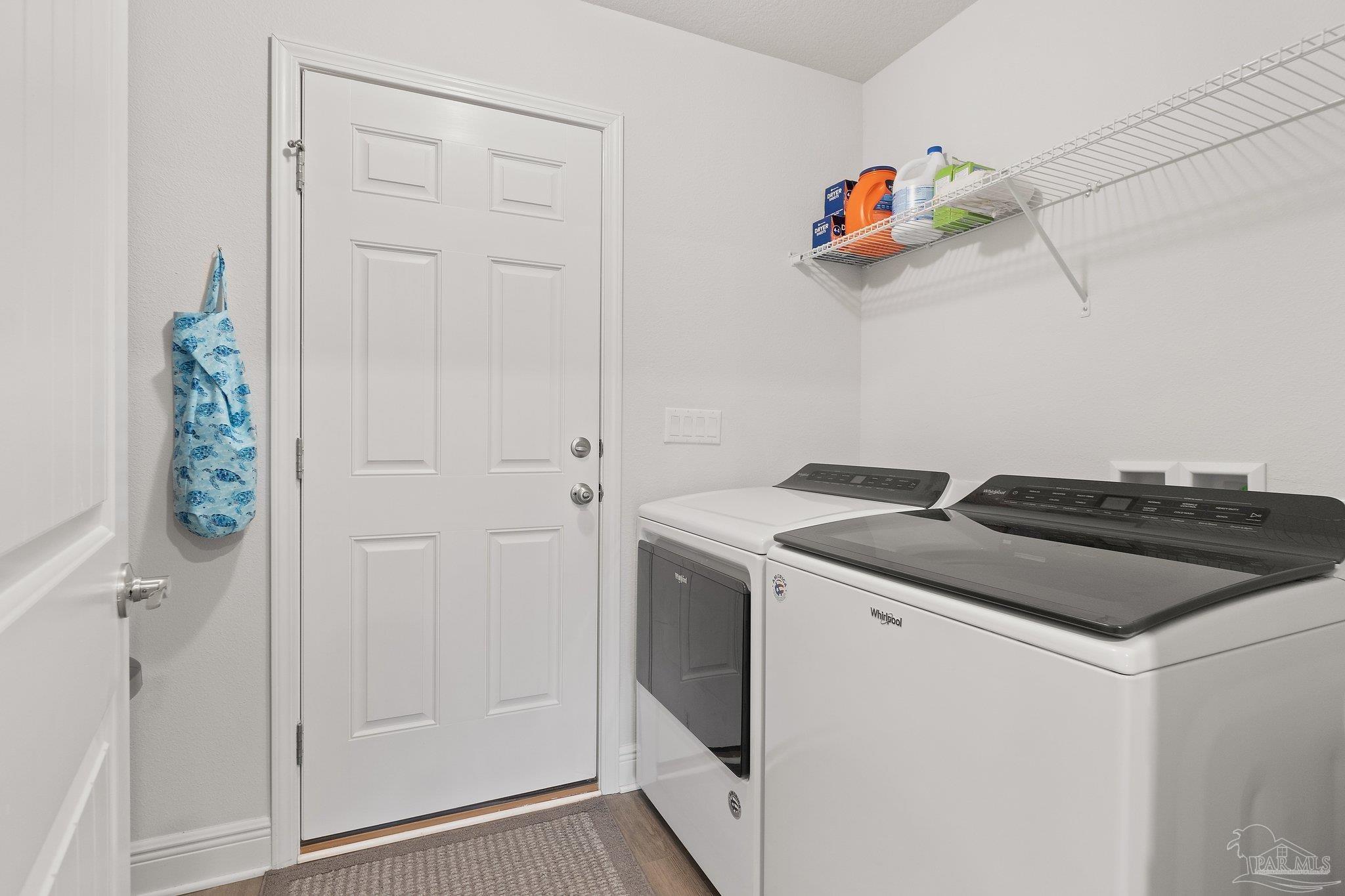 1463 Promenade Loop Cantonment, FL 32533 - Photo 19 of 41 a utility room with dryer and washer
