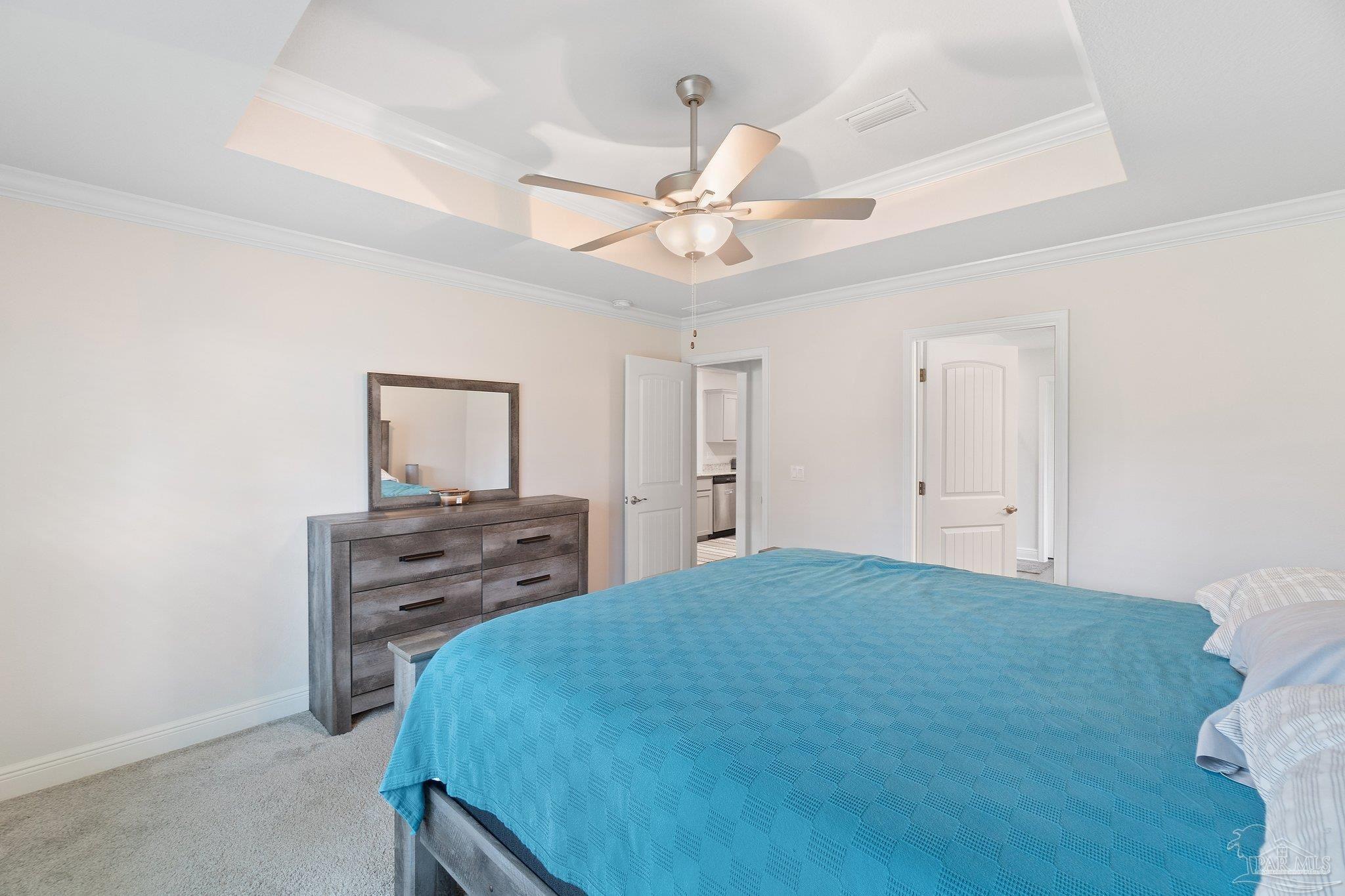 1463 Promenade Loop Cantonment, FL 32533 - Photo 22 of 41 a bedroom with a bed and a table