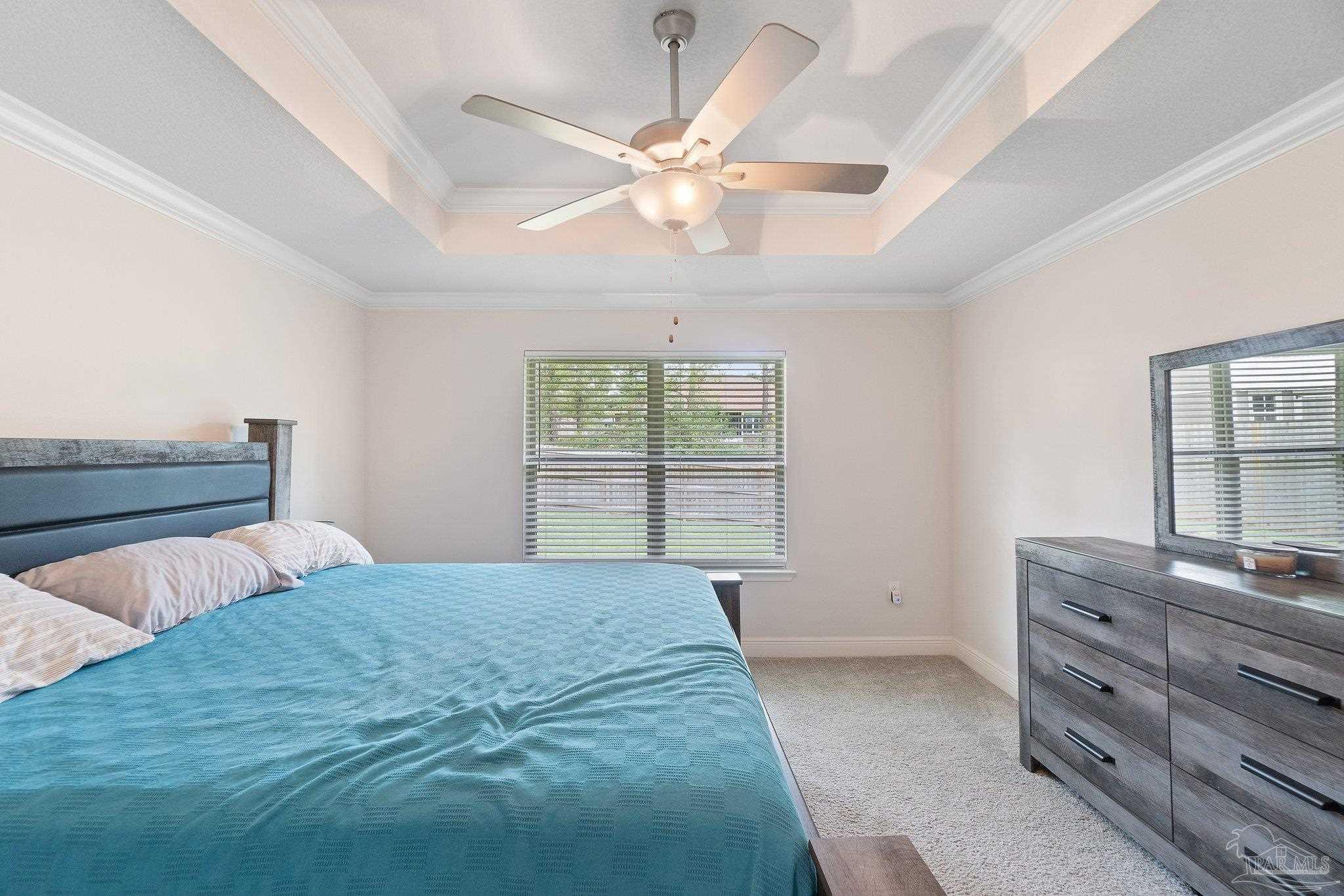 1463 Promenade Loop Cantonment, FL 32533 - Photo 23 of 41 a bedroom with a bed and window
