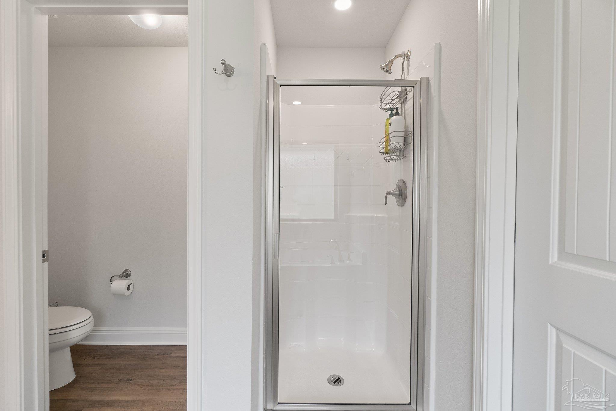 1463 Promenade Loop Cantonment, FL 32533 - Photo 26 of 41 a bathroom that has a glass shower door