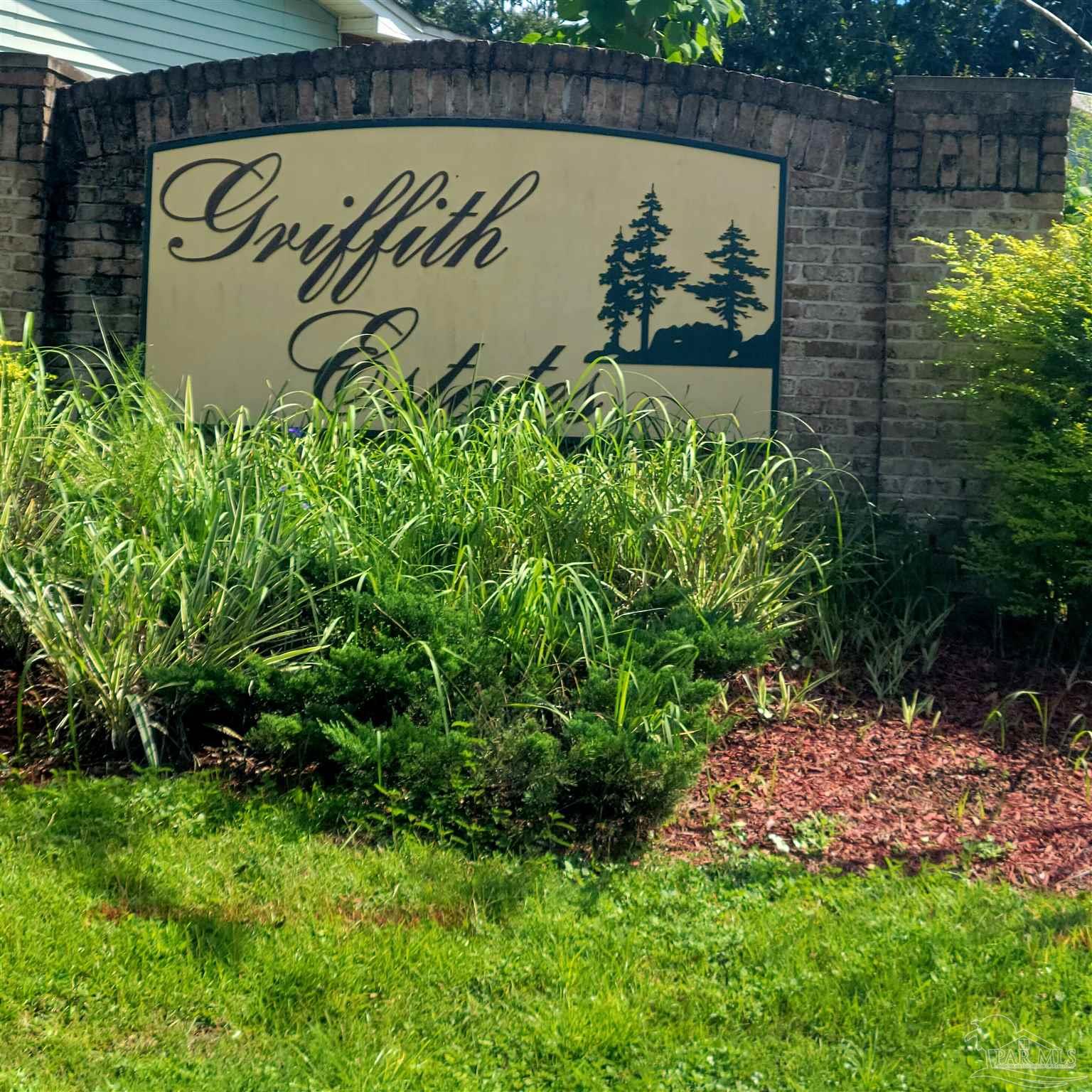 1463 Promenade Loop Cantonment, FL 32533 - Photo 40 of 41 a view of a sign in a garden