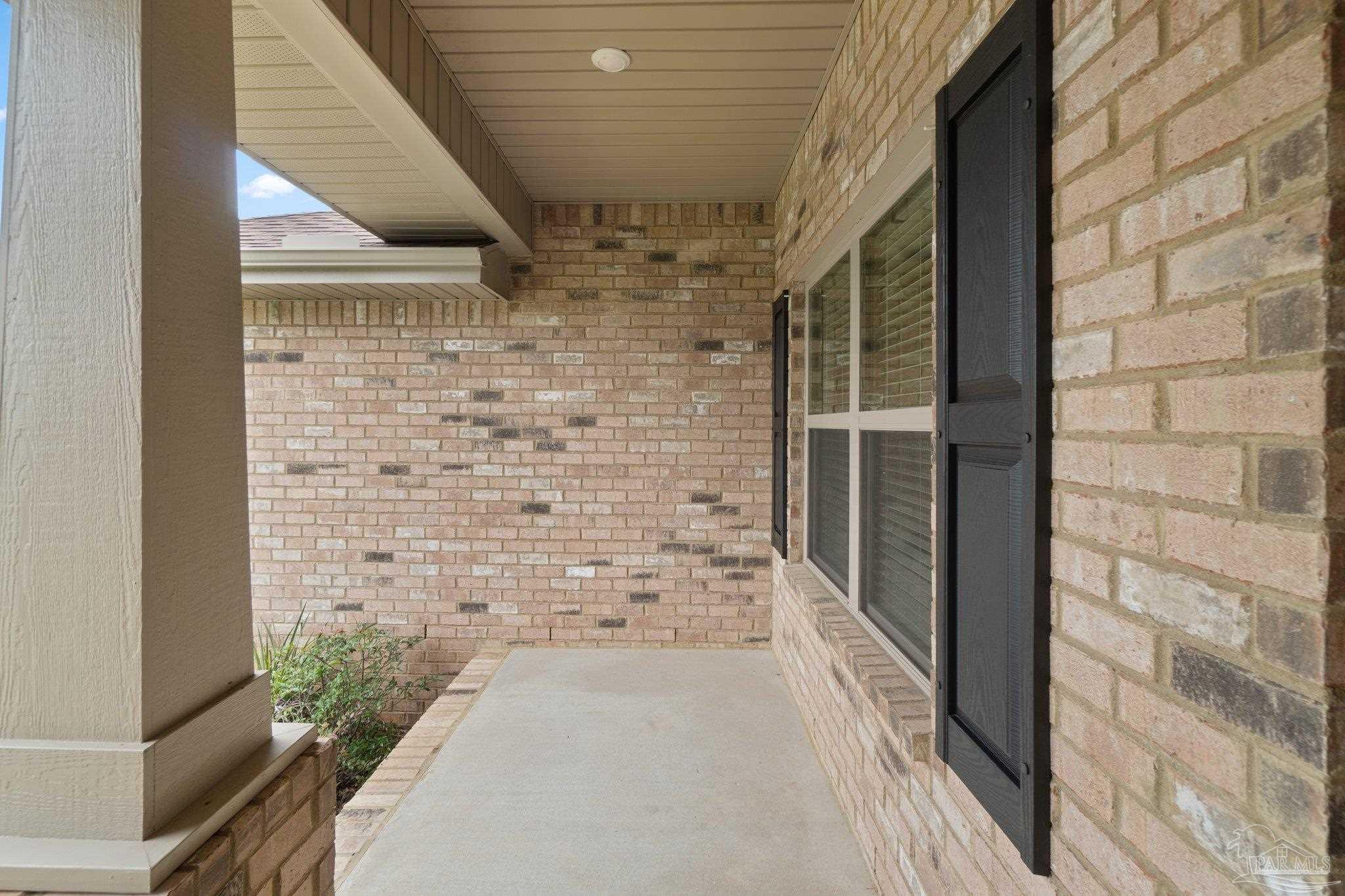 1463 Promenade Loop Cantonment, FL 32533 - Photo 4 of 41 a view of front door of house