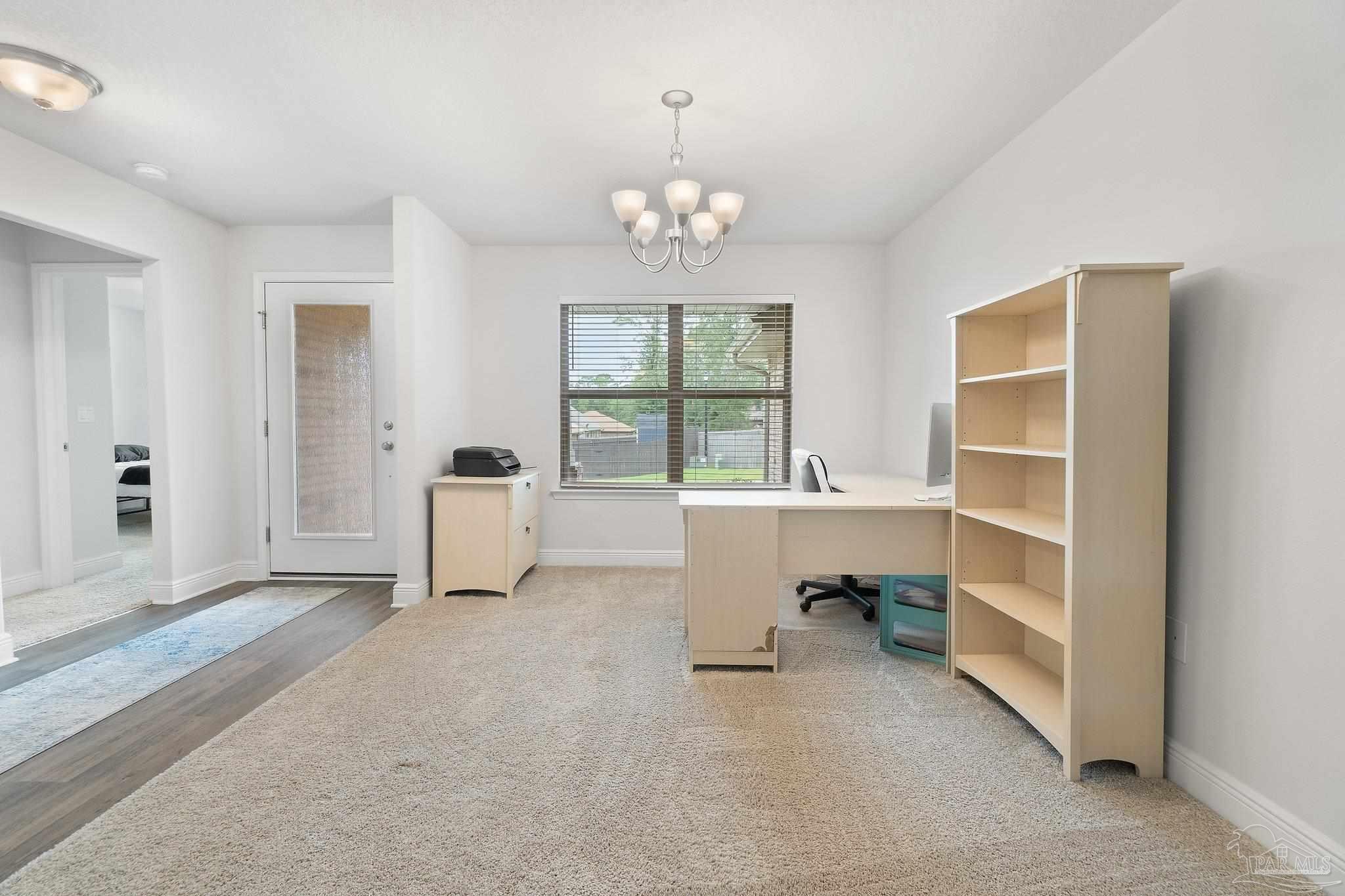 1463 Promenade Loop Cantonment, FL 32533 - Photo 8 of 41 a view of an empty room with a window