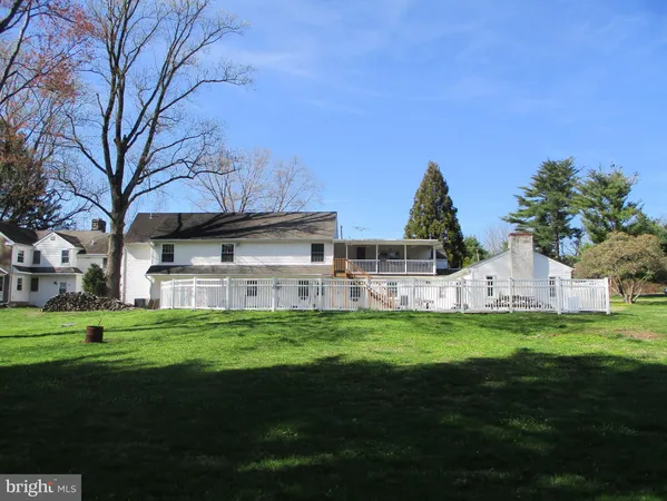 a view of a house with a big yard