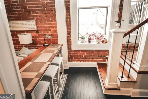 a view of a balcony with chairs