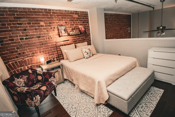 a bed room with a bed and a couch