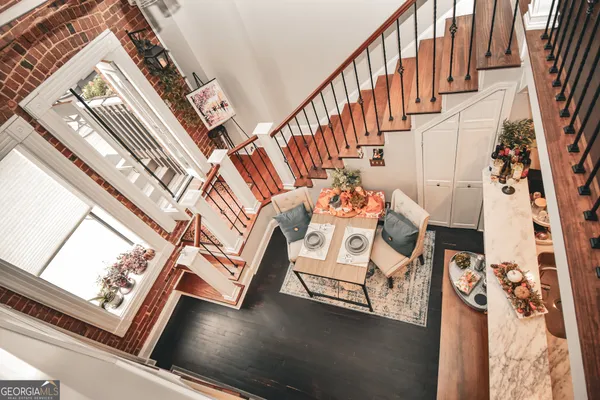 a view of a porch with a floor to ceiling window