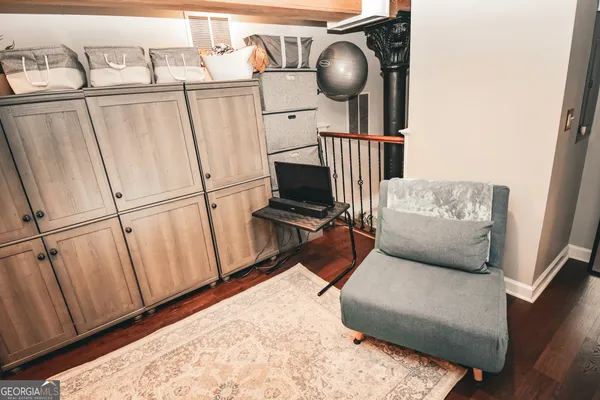 a view of livingroom with furniture and wooden floor