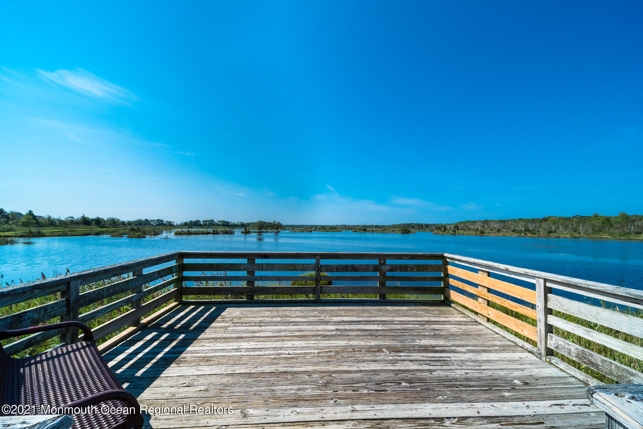 222 Edison Road Barnegat, NJ 08005 - Photo 44 of 50 a view of a terrace with outdoor seating and lake