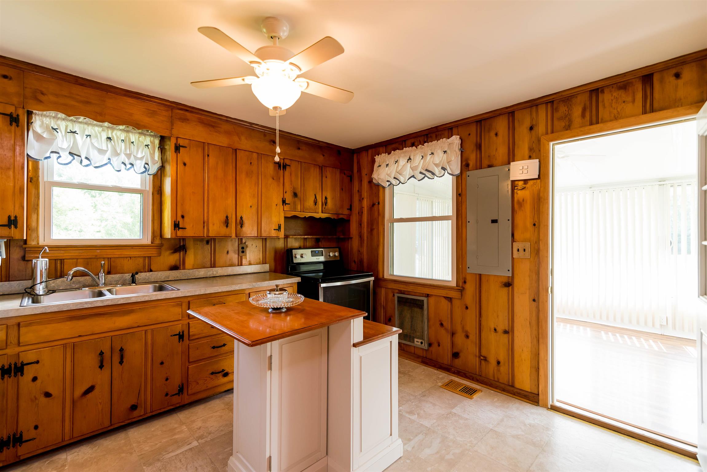 2949 Morgan Road Joelton, TN 37080 - Photo 8 of 23 PLENTY OF LIGHT & WINDOWS IN THIS KITCHEN! VINTAGE KNOTTY PINE WALLS ADD SO MUCH CHARACTER!