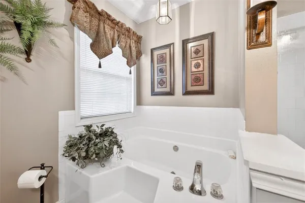 a bathroom with a sink and a bathtub