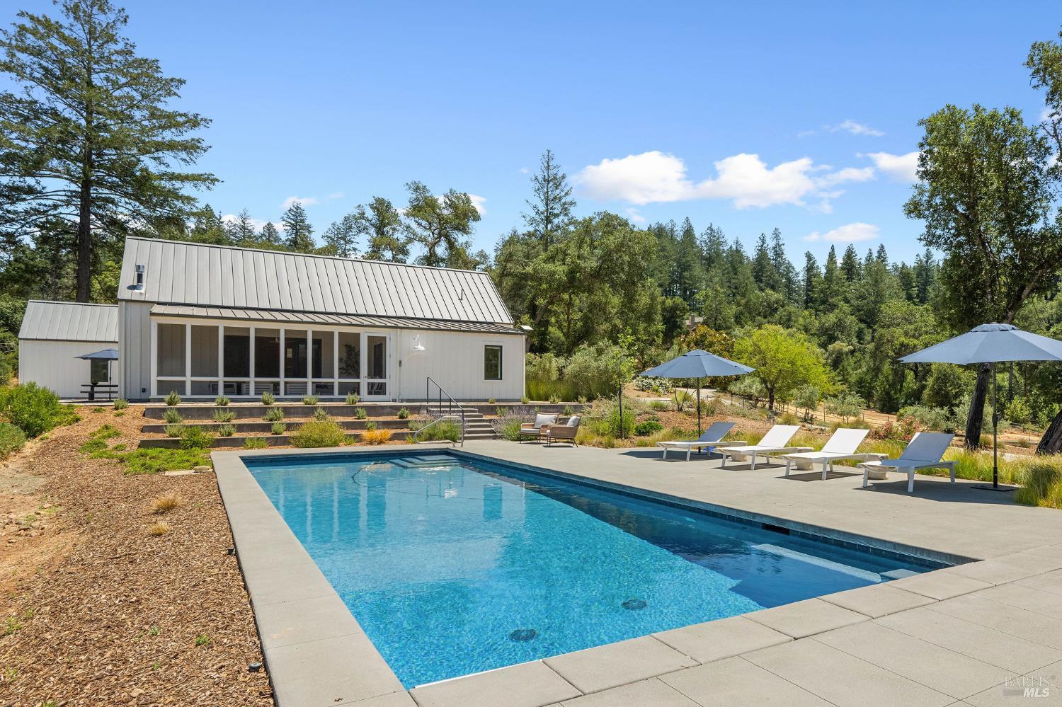 18907 Highway 128 Calistoga, CA 94515 - Photo 11 of 46 a view of a house with pool and chairs