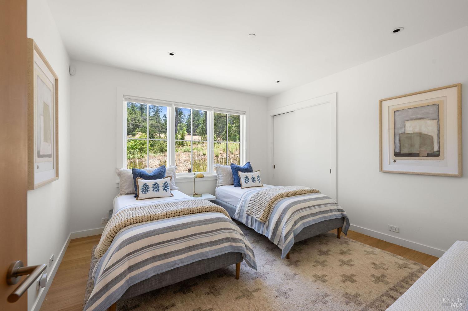 18907 Highway 128 Calistoga, CA 94515 - Photo 22 of 46 a bedroom with two beds and a potted plant