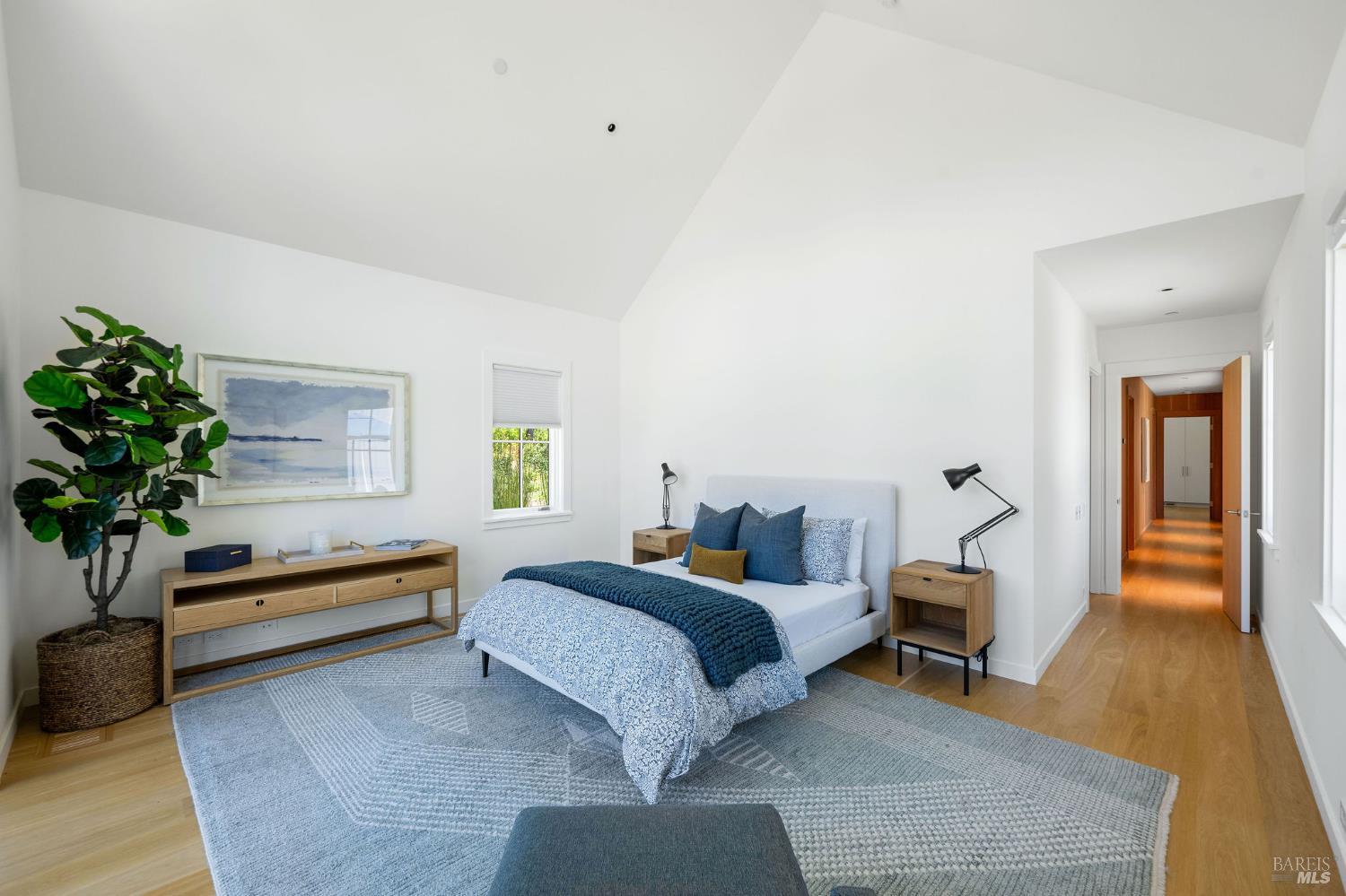 18907 Highway 128 Calistoga, CA 94515 - Photo 25 of 46 a bedroom with a bed and a potted plant