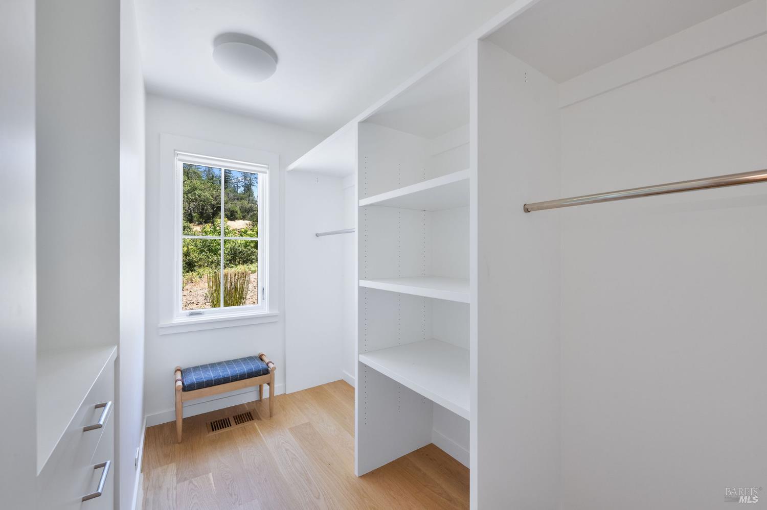 18907 Highway 128 Calistoga, CA 94515 - Photo 28 of 46 a view of a room with a window and wooden floor
