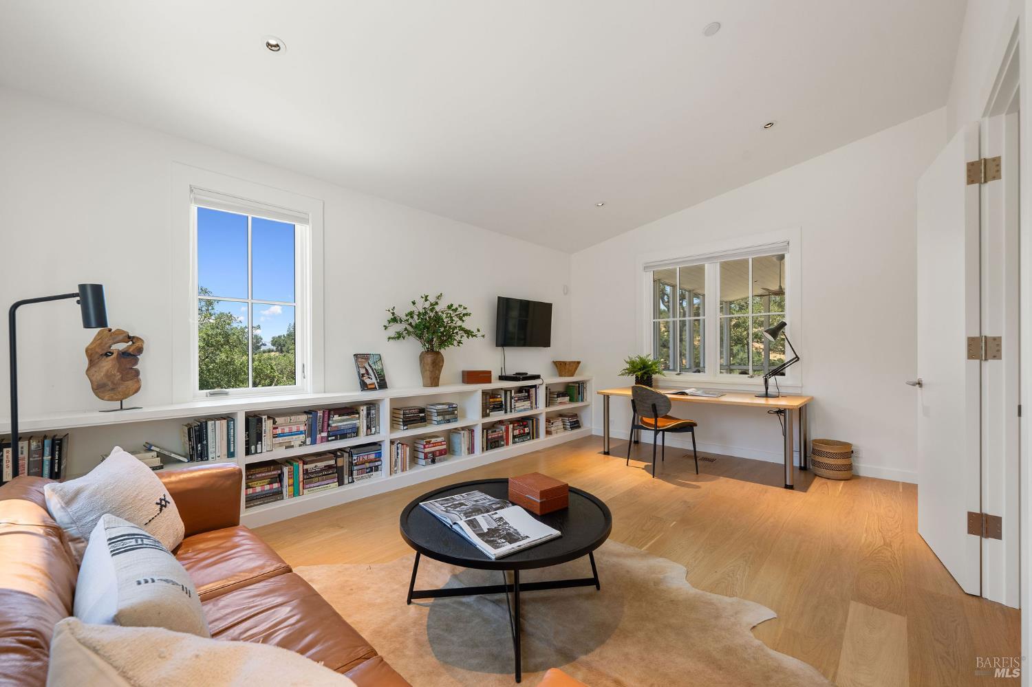 18907 Highway 128 Calistoga, CA 94515 - Photo 31 of 46 a living room with furniture and a flat screen tv