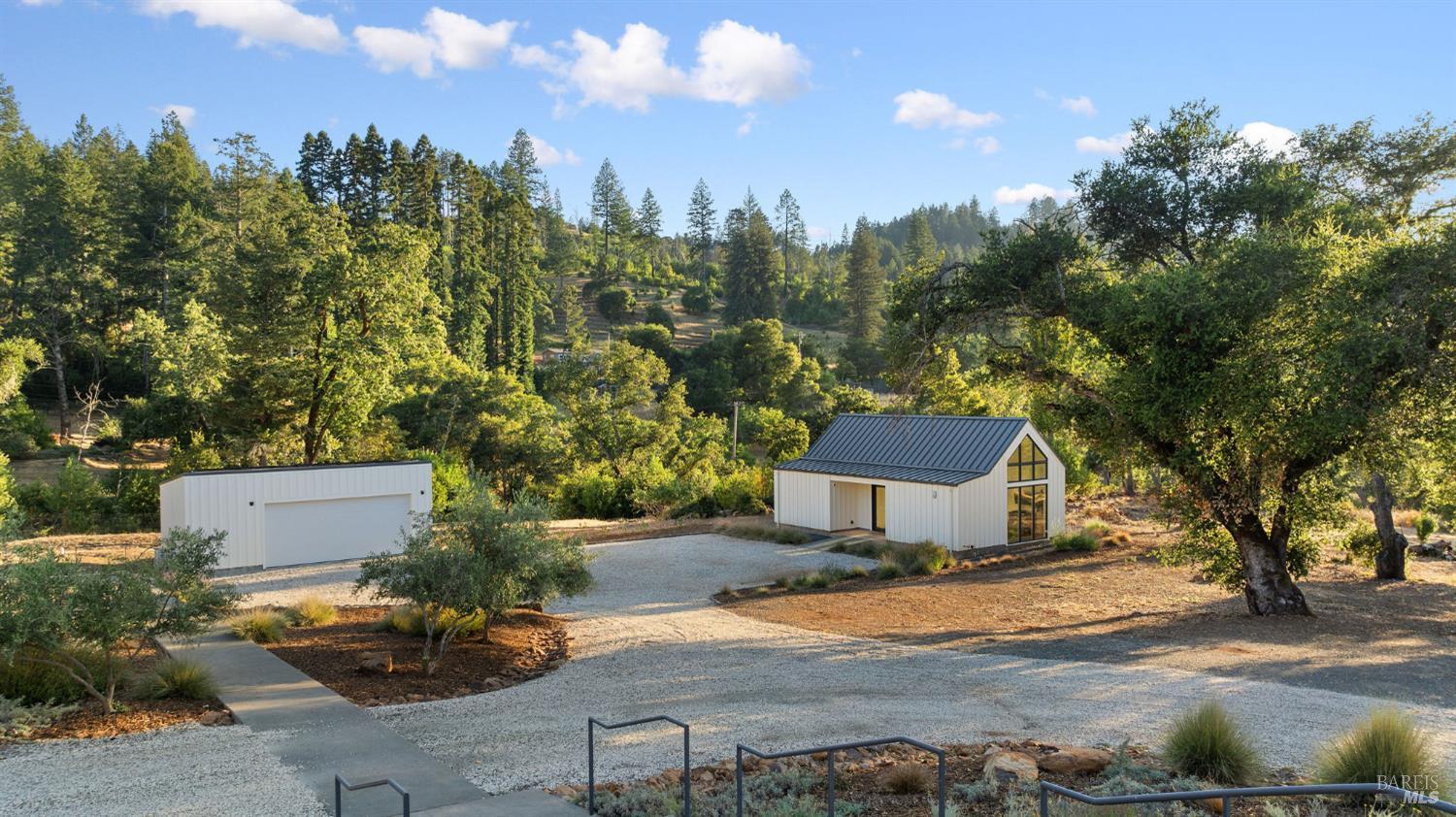18907 Highway 128 Calistoga, CA 94515 - Photo 36 of 46 a view of a house with a yard and tree s