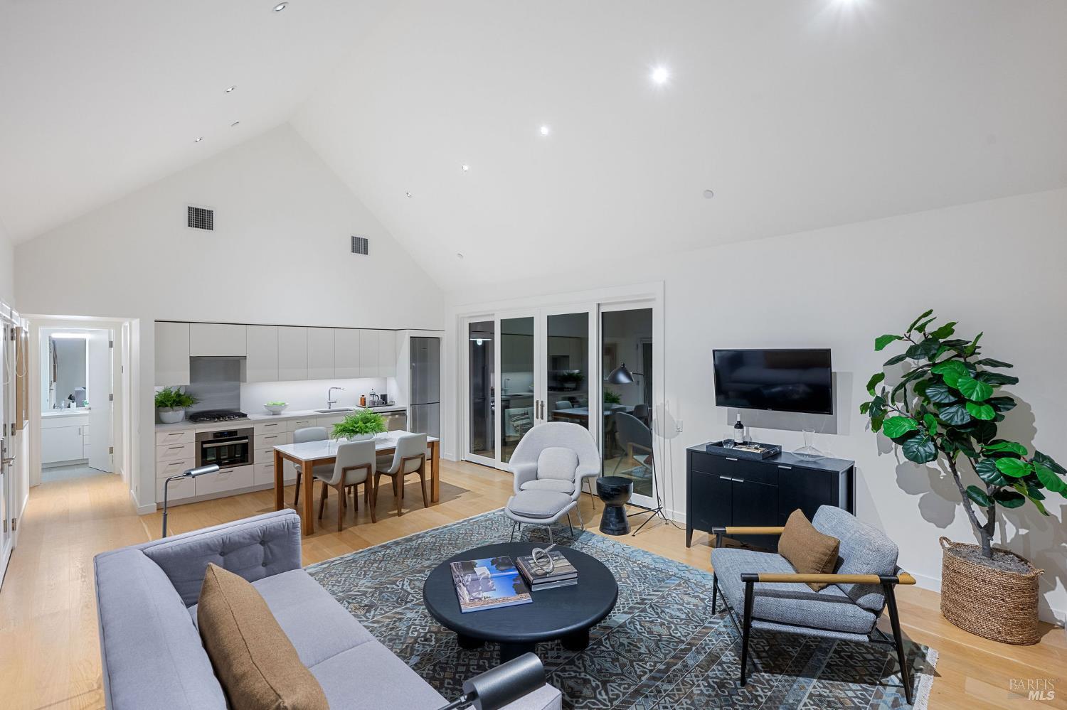 18907 Highway 128 Calistoga, CA 94515 - Photo 38 of 46 a living room with furniture a fireplace and a flat screen tv