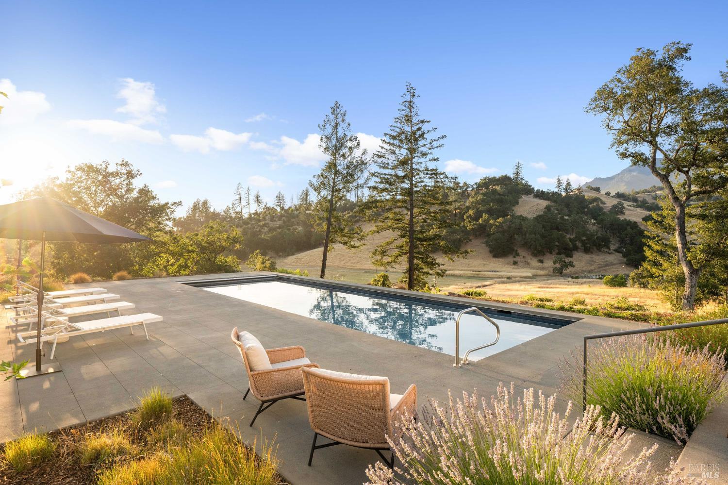 18907 Highway 128 Calistoga, CA 94515 - Photo 4 of 46 a view of a swimming pool with a patio