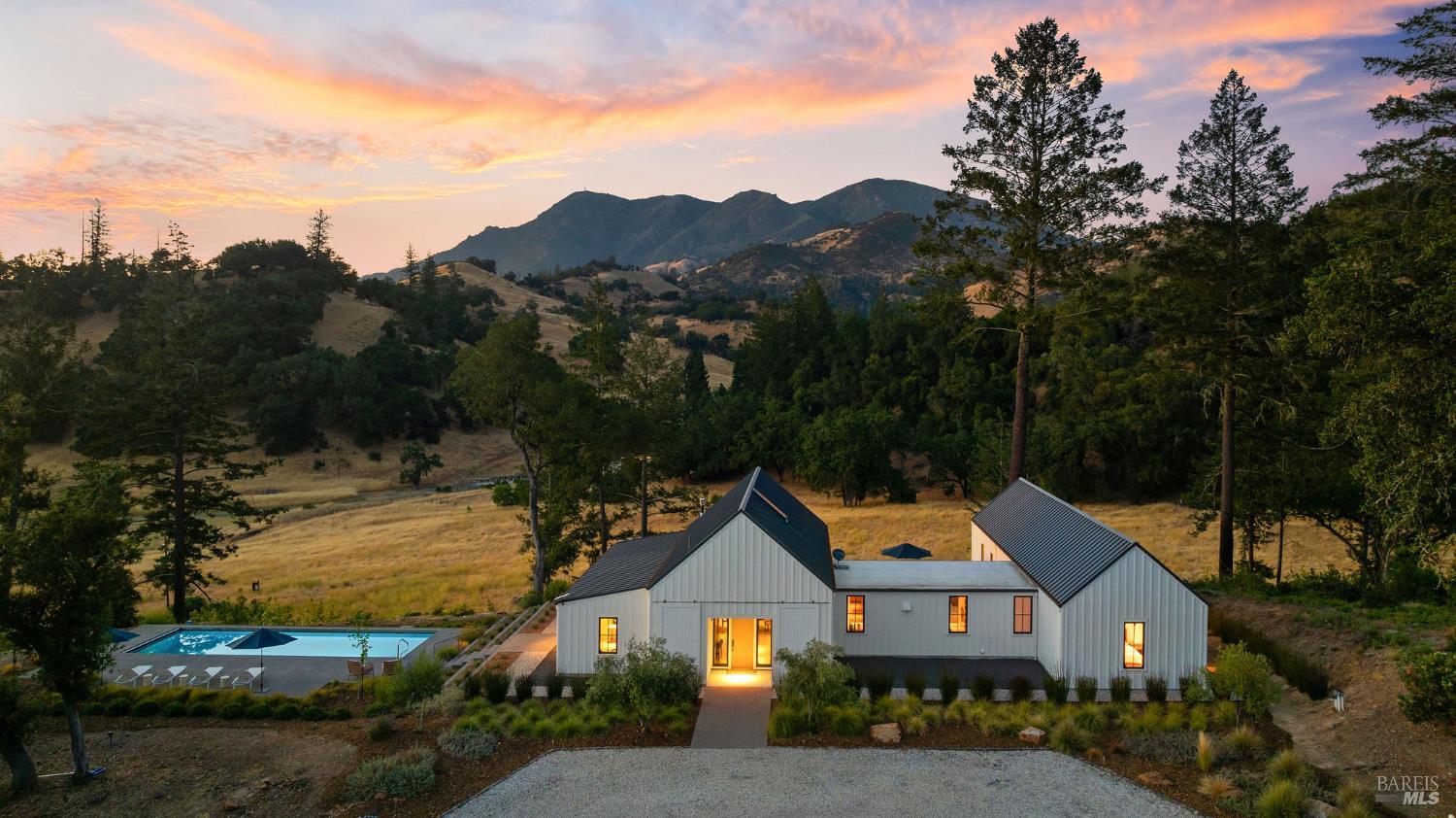 18907 Highway 128 Calistoga, CA 94515 - Photo 44 of 46 a aerial view of a house in a big yard with large trees