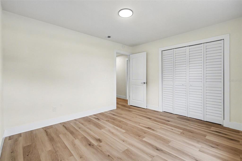 707 Queens Court Seffner, FL 33584 - Photo 10 of 28 wooden floor in a room