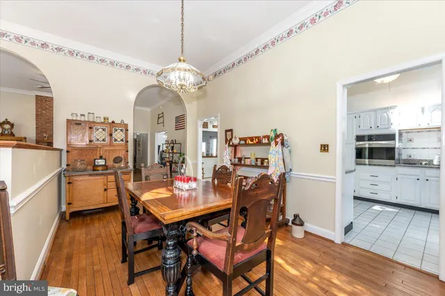 a kitchen with stainless steel appliances a stove sink and cabinets