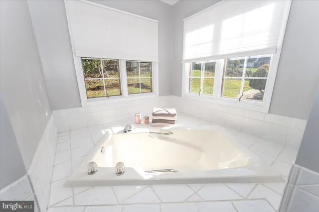 a bathroom with a shower curtain