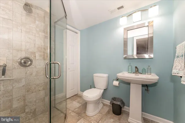 a view of a playground with basketball court