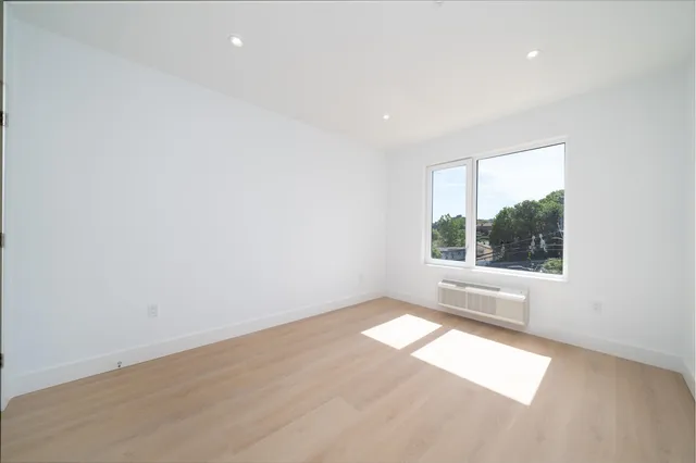 an empty room with windows