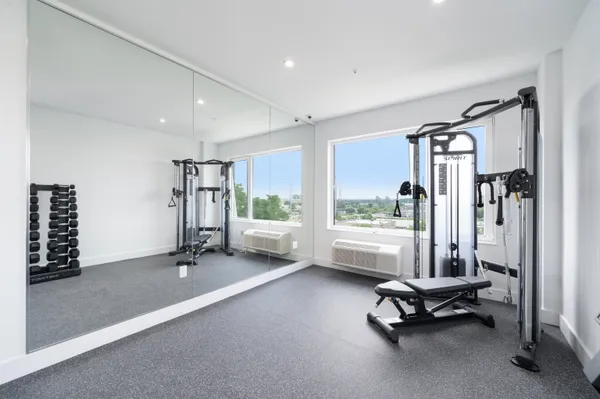 a view of a room with gym equipment