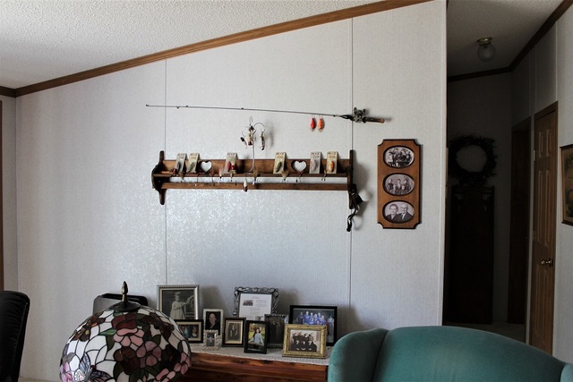 13806 Prairie Center Road Morrison, IL 61270 - Photo 14 of 24 a view of storage and utility room with racks on the wall