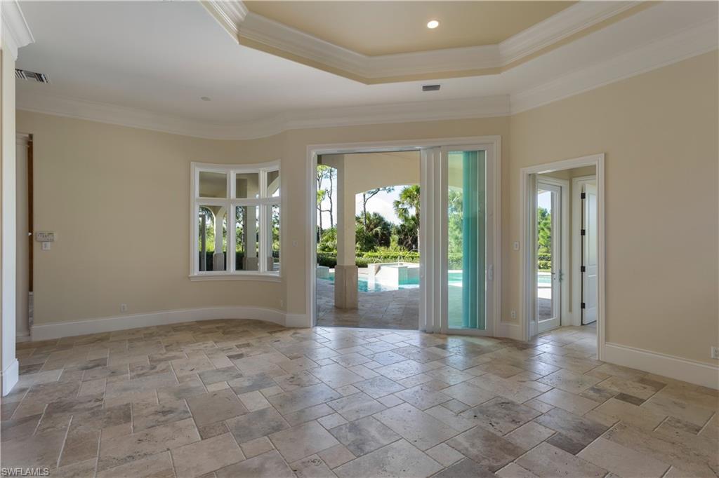 3875 Isla Del Sol Way Naples, FL 34114 - Photo 16 of 24 a view of livingroom with front door and porch