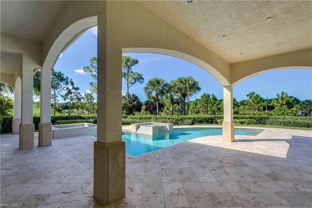 3875 Isla Del Sol Way Naples, FL 34114 - Photo 20 of 24 a house view with a garden