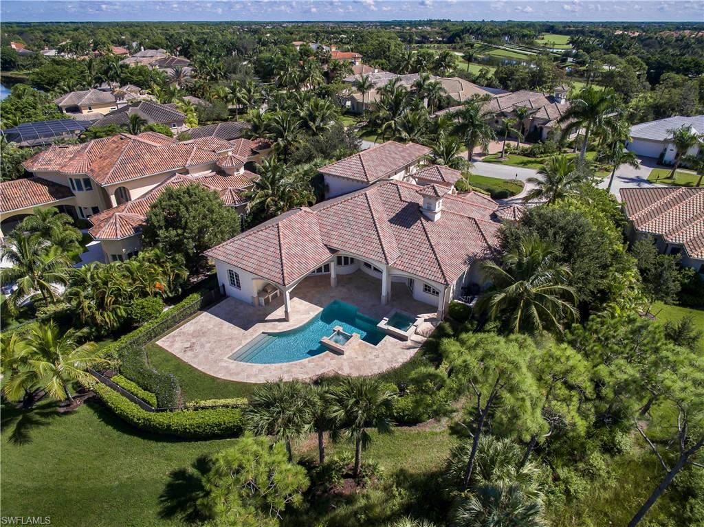 3875 Isla Del Sol Way Naples, FL 34114 - Photo 6 of 24 an aerial view of a house with a garden