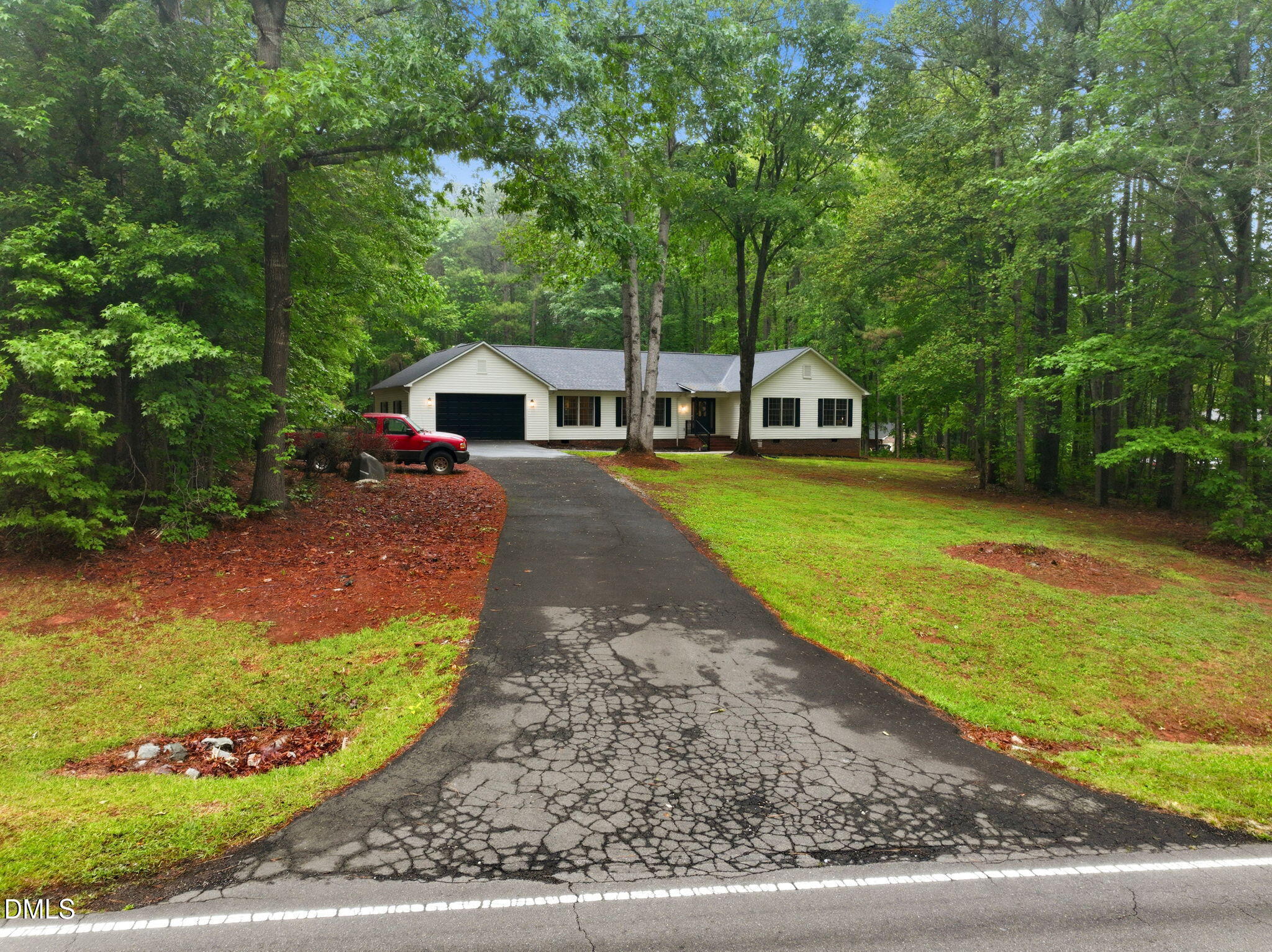1925 Old Allensville Road Roxboro, NC 27574 - Photo 56 of 58 front view of a house with a yard