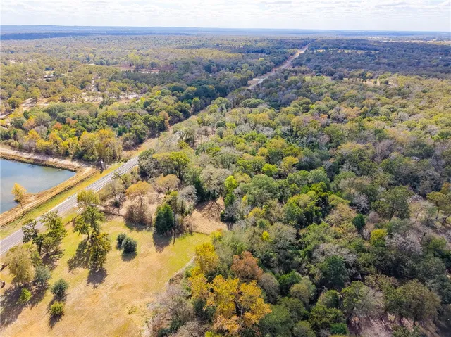 a view of a city with mountains in the background
