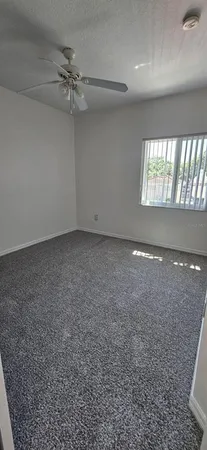 a bathroom with a toilet and a bathtub